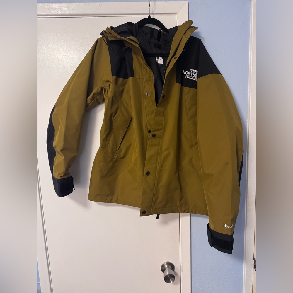 The North Face Khaki and Black Outdoor Jacket mountain jacket